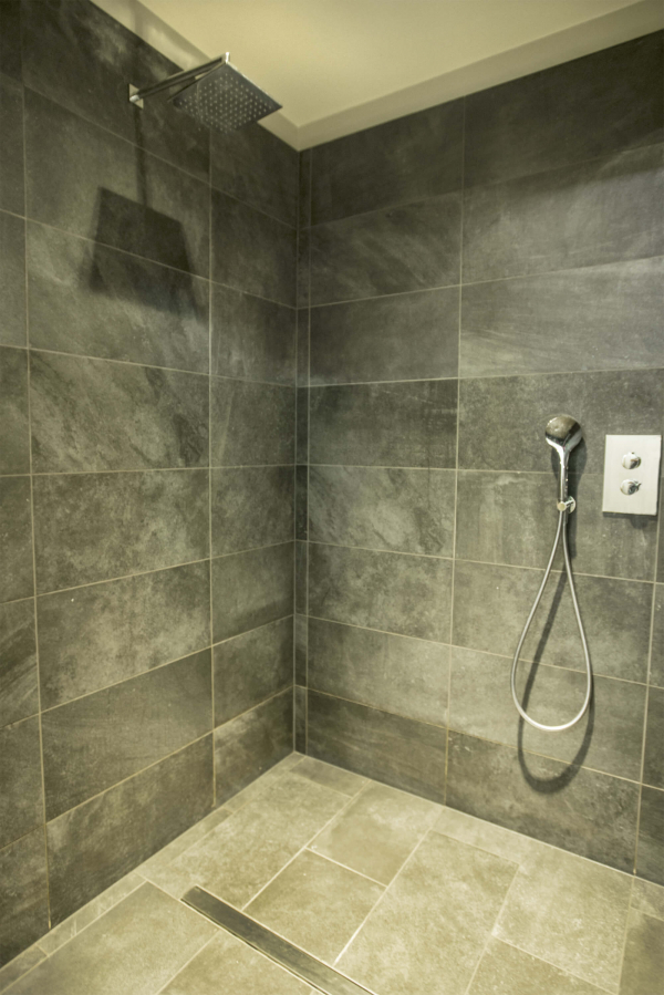 Hotel Camp Zero Stone effect tiles shower